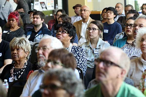 Multi-generational crowd views 'The Wake of Vanport' at the April 2016 screening