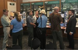 Photo of people discussing levees during a 2016 technical forum
