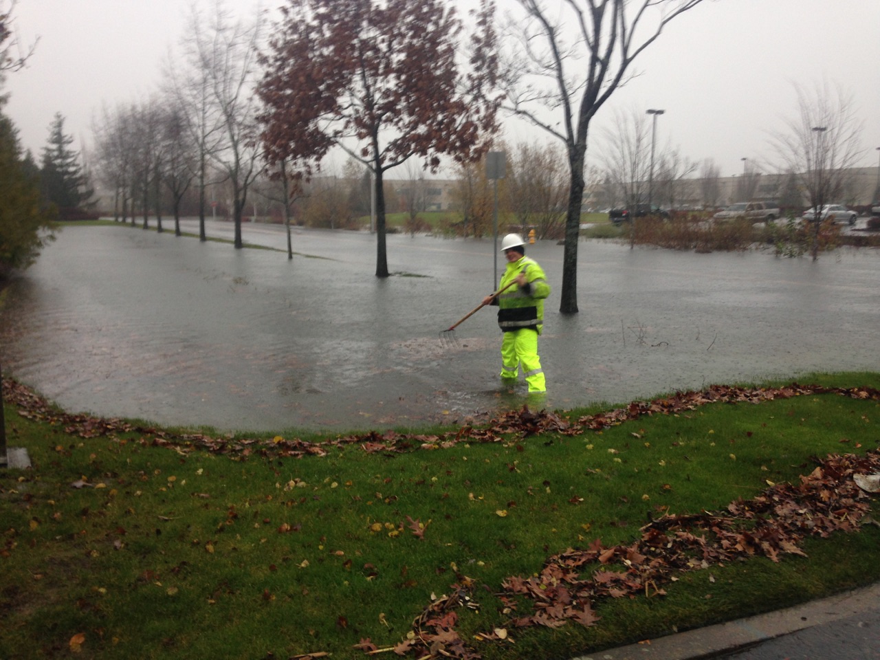 Photo of drainage district staff cleaning up debris during 2015 high water event
