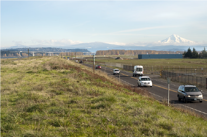 Photo of cars driving along Marine Drive, which is on top of the primary columbia river levee