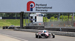 Photo of a car racing at Portland International Raceway