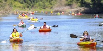 large group of people kayaking on the Columbia Slough during the Columbia Slough Watershed Council's Regatta event