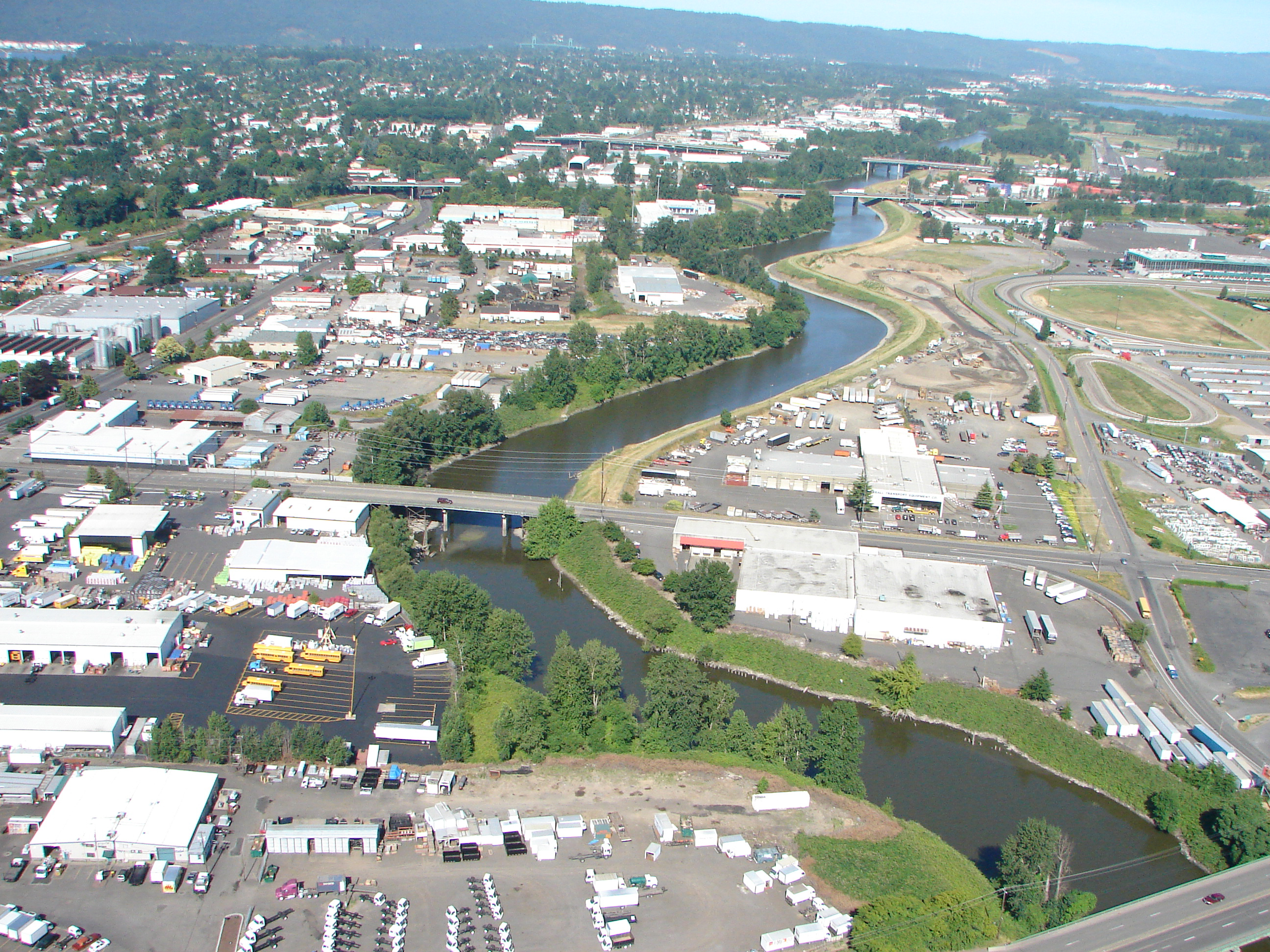 Photo of the Columbia Corridor industrial buildings and the Columbia Slough